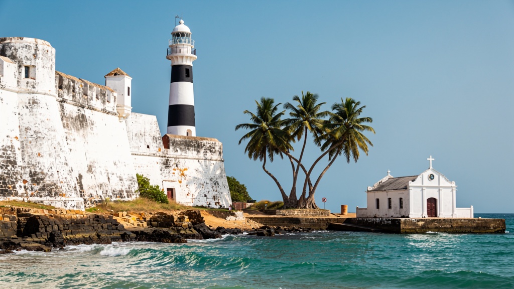 Overview of Diu island landmarks: fort walls, lighthouse, Hoka palms, churches and the sea